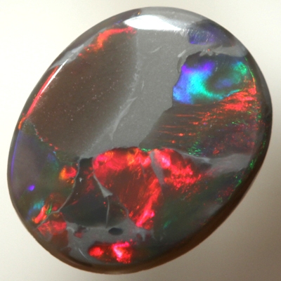 SOLID BLACK OPAL Unusual play of colour, bright fire